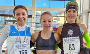 trino mezza maratona podio